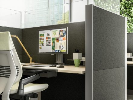 computer and accessories on a workstation